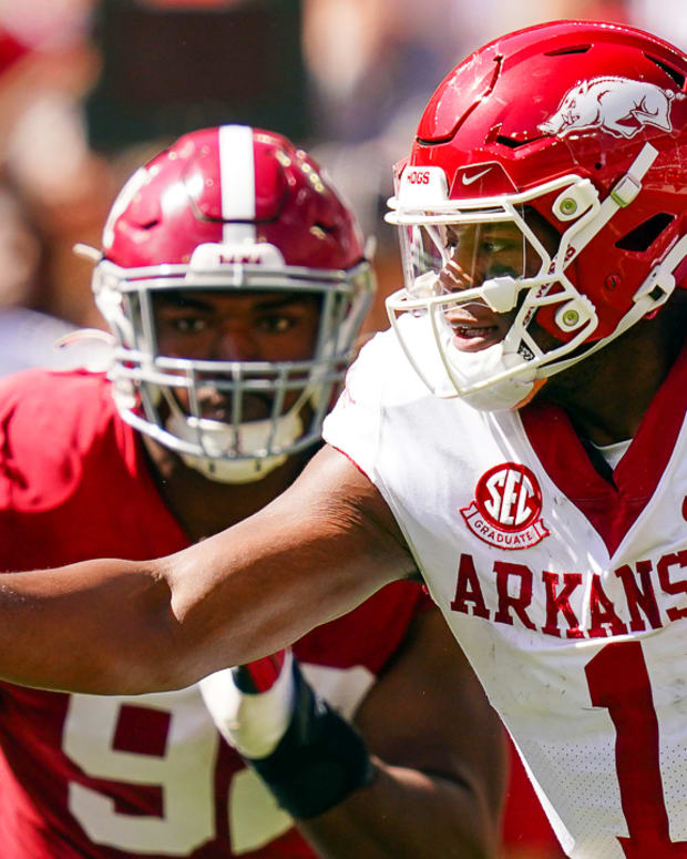 Razorbacks quarterback KJ Jefferson scrambling for yardage against Alabama